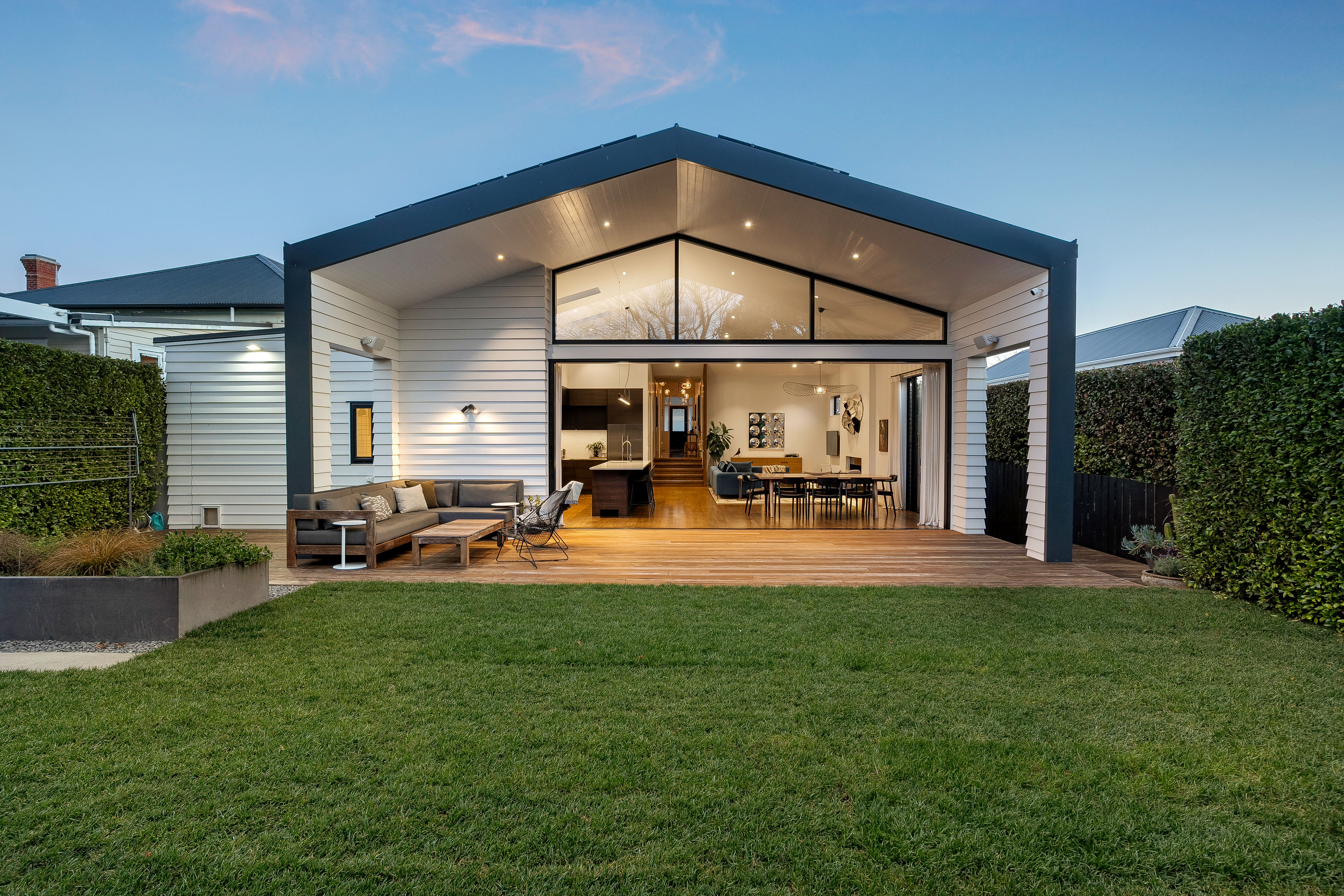 Outside of the home looking in at the new renovated part