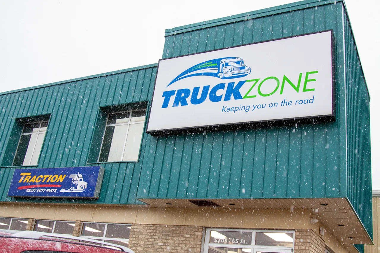 Truck Zone heavy-duty repair facility in Western Canada with signage reading “Keeping you on the road.”