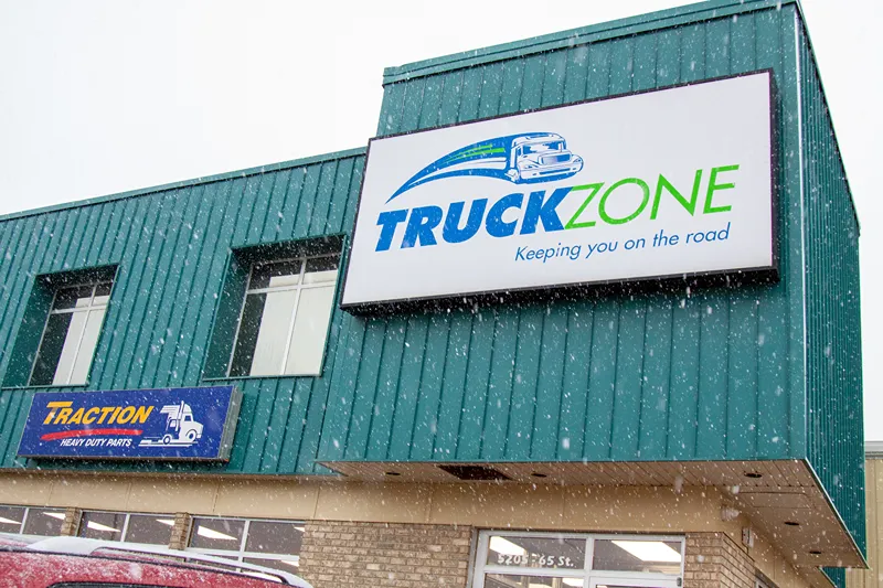 Truck Zone heavy-duty repair facility in Western Canada with signage reading “Keeping you on the road.”