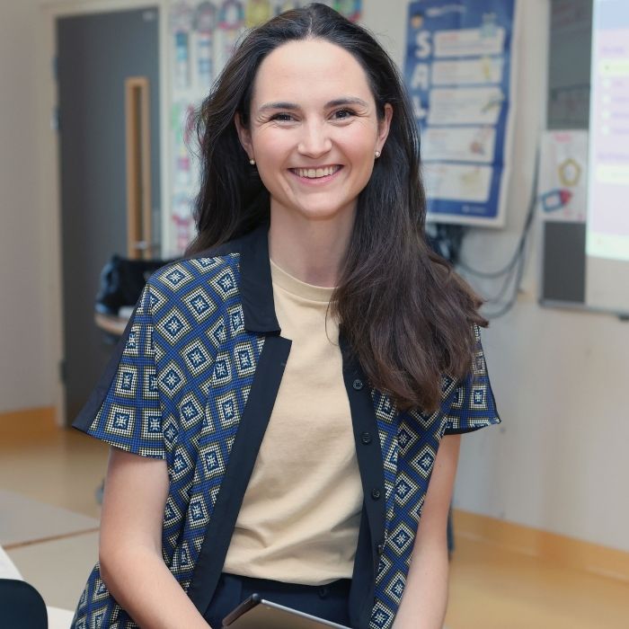 Portrait of Ingrid Skrede sitting in a classroom