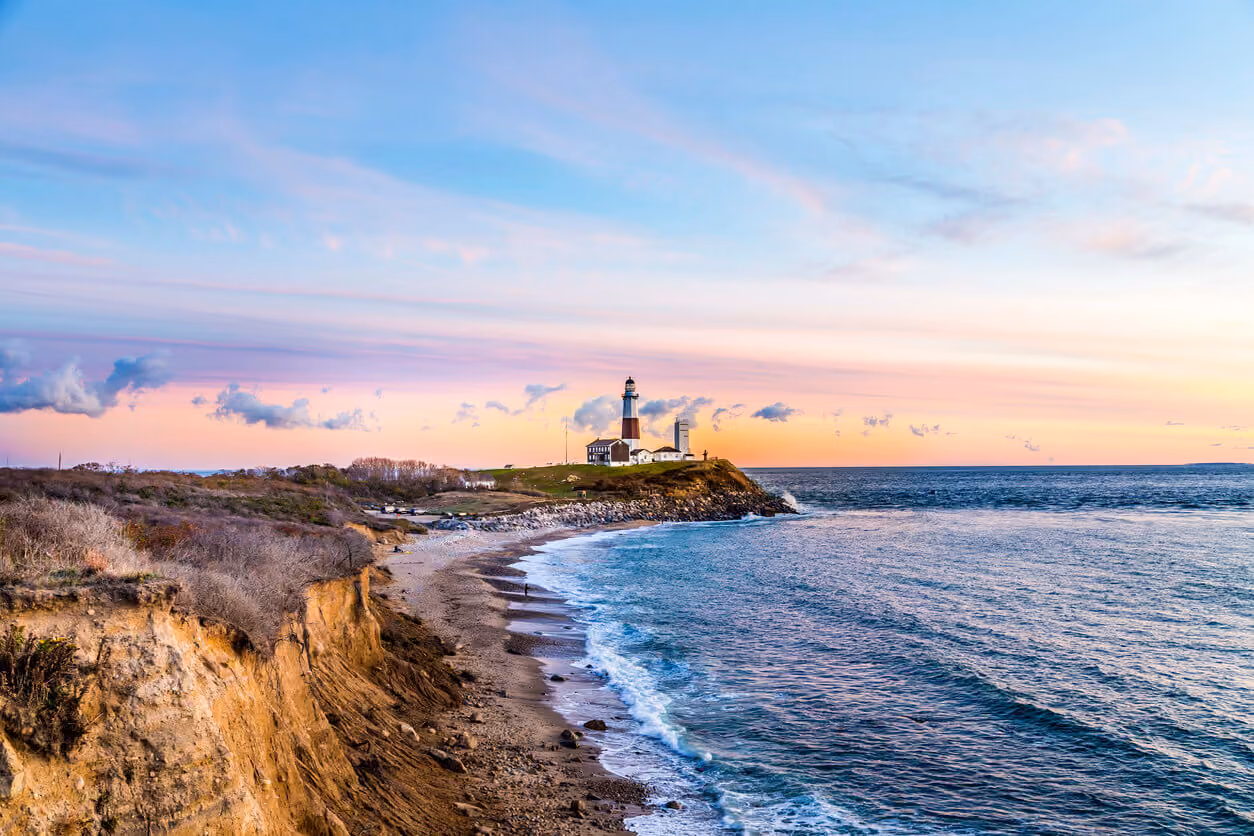 beach view with lighthouse long island ny