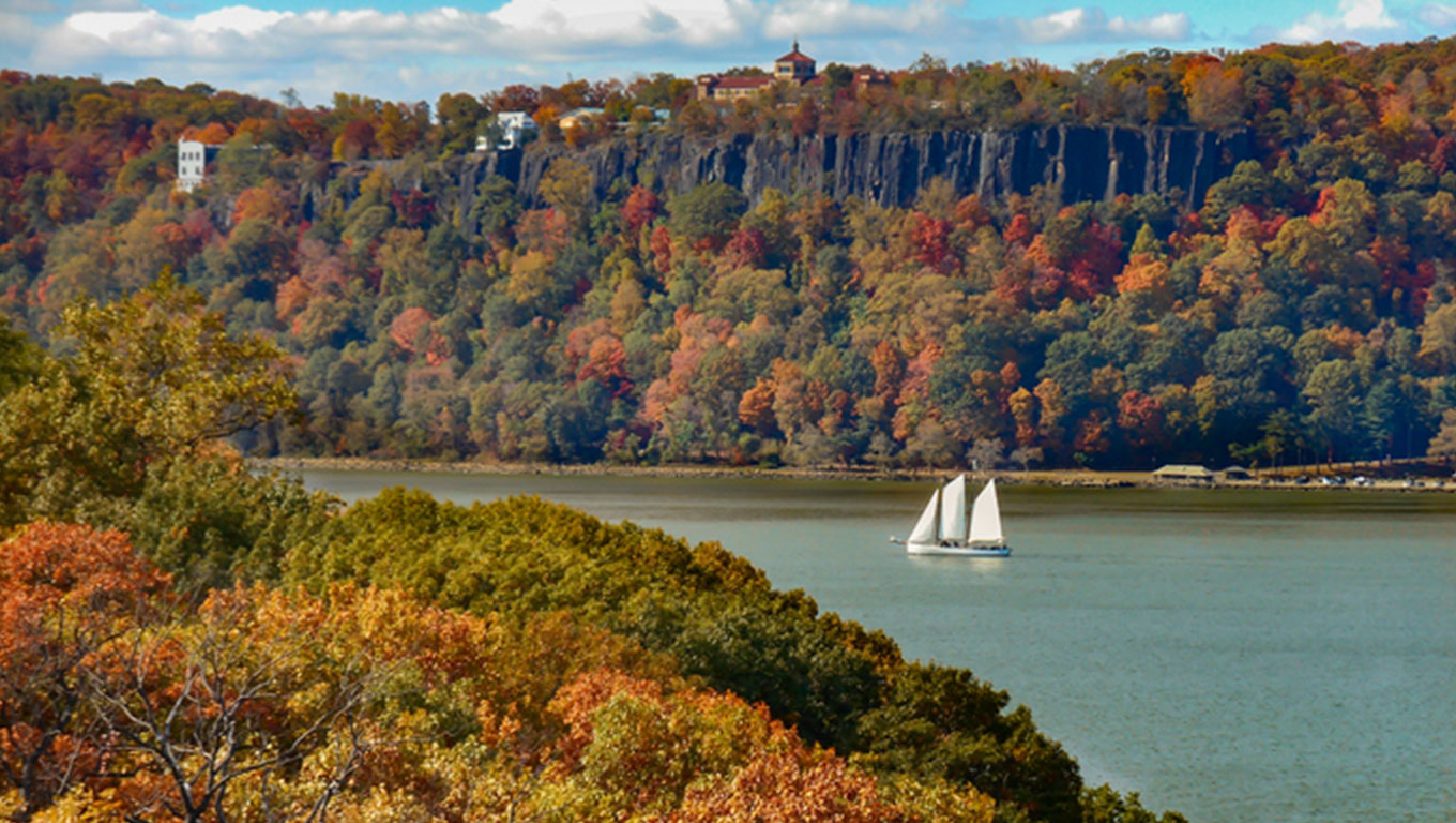 Hudson River Palisades and Sailboat in Autumn - boat insurance in new york concept