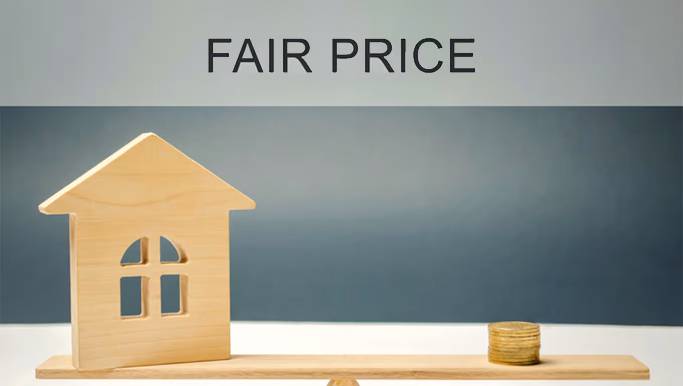 coins and house on the scales with the words Fair price