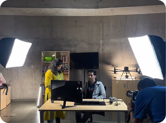 Filming a man with a drone.