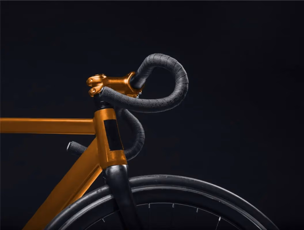 Minimalist creative bicycle design close-up by modern design and development studio, black background.