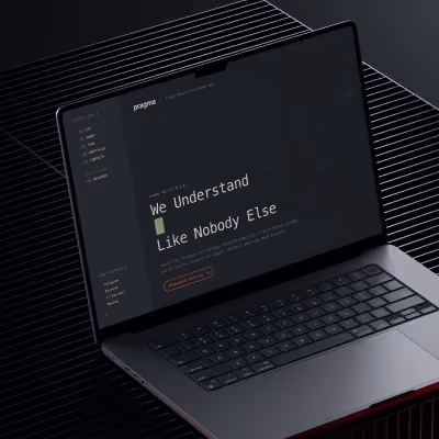 Pragma website with dark code-style interface and tagline ‘We Understand Like Nobody Else’.