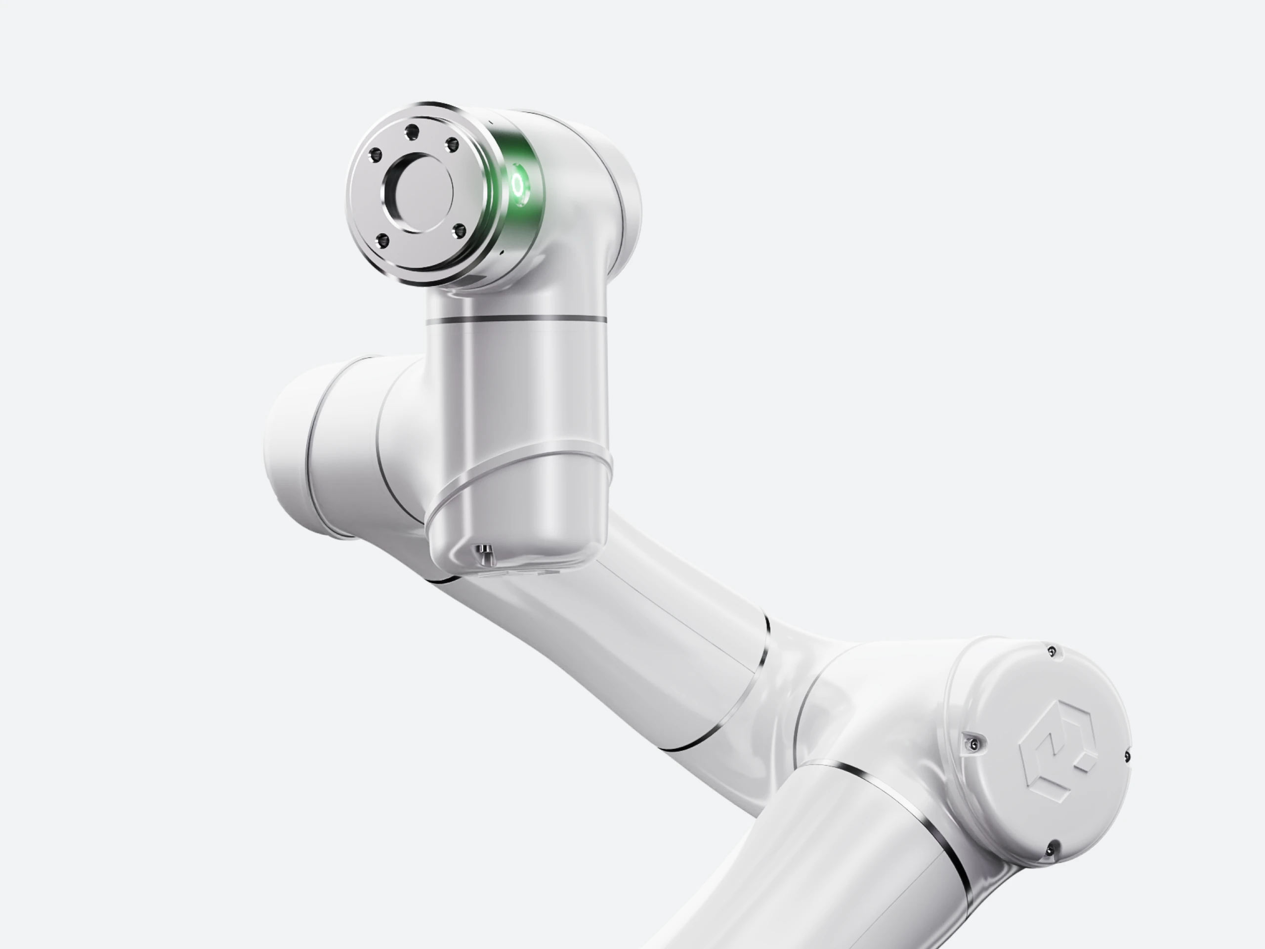 Close-up of a sleek white industrial robotic arm with precision joints, designed for automation in manufacturing and advanced robotics systems.