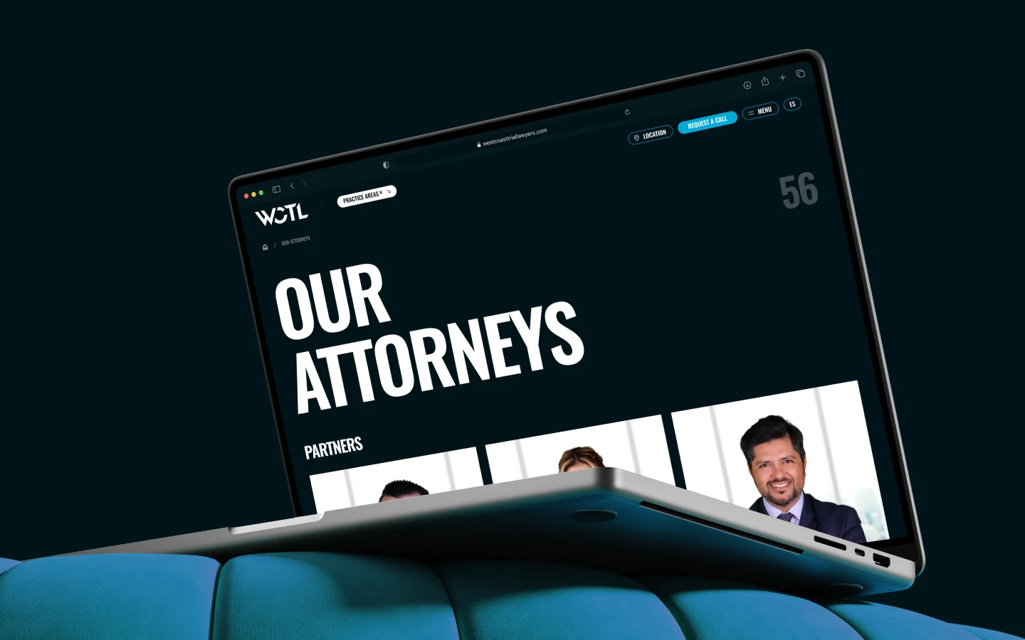 WCTL law firm website page on laptop displaying team member profiles under "Our Attorneys."