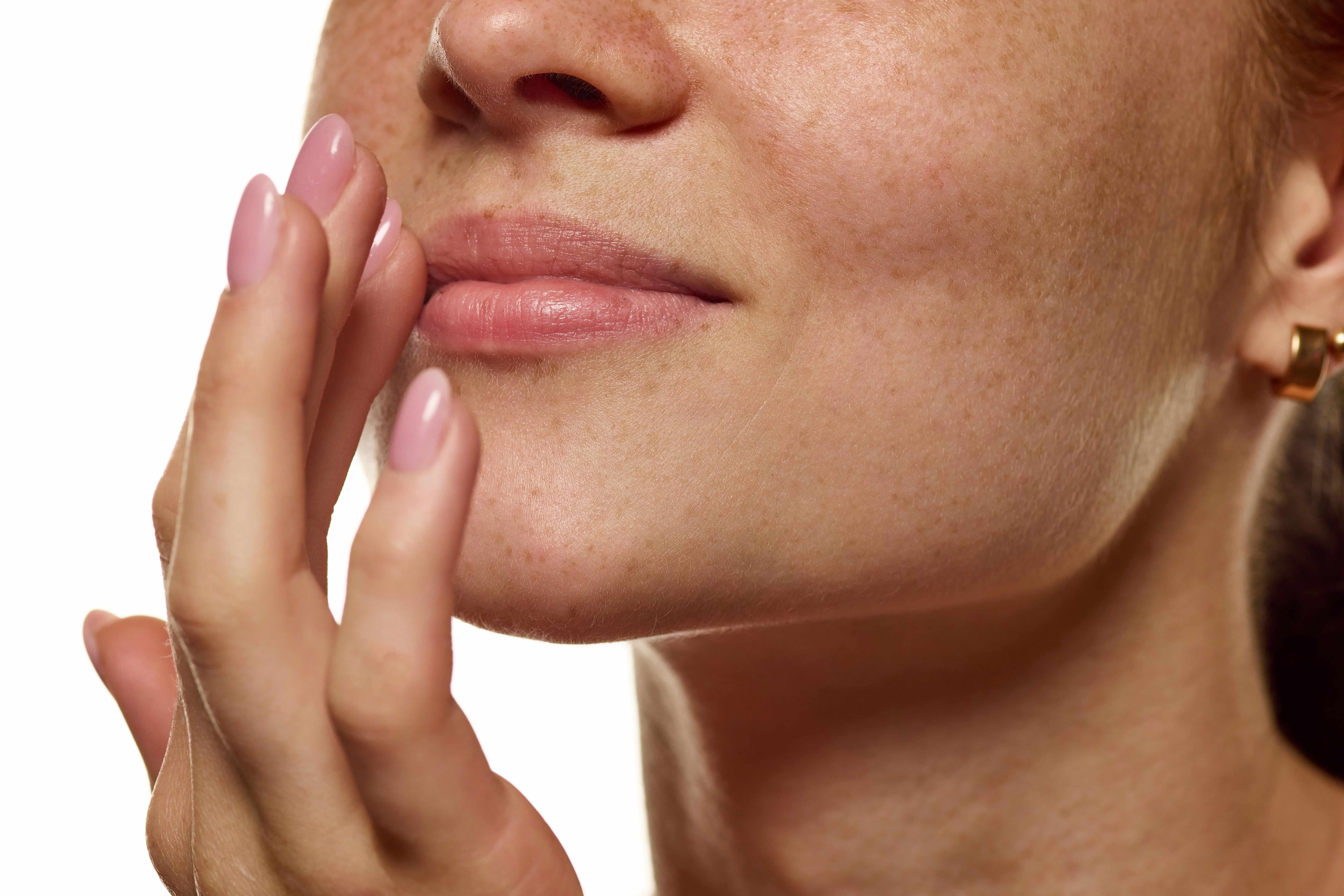 Smooth facial skin after professional face waxing
