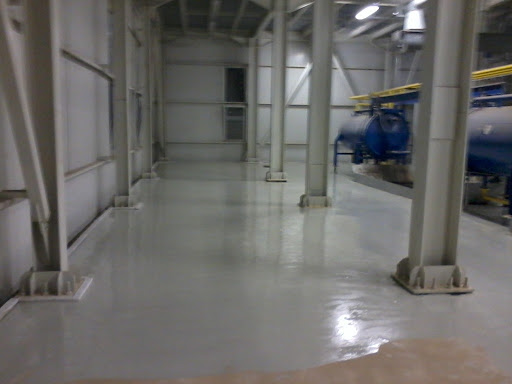 Chemical spill resistant epoxy floor coating installation