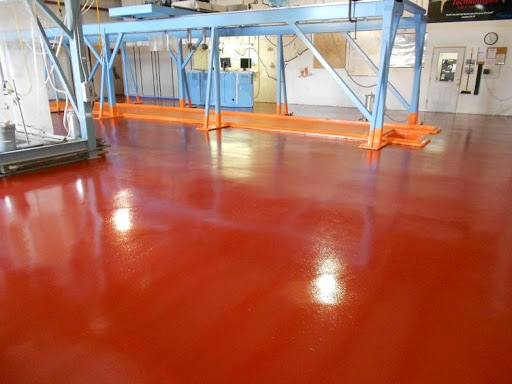 Chemical resistant coating protecting industrial floor surface