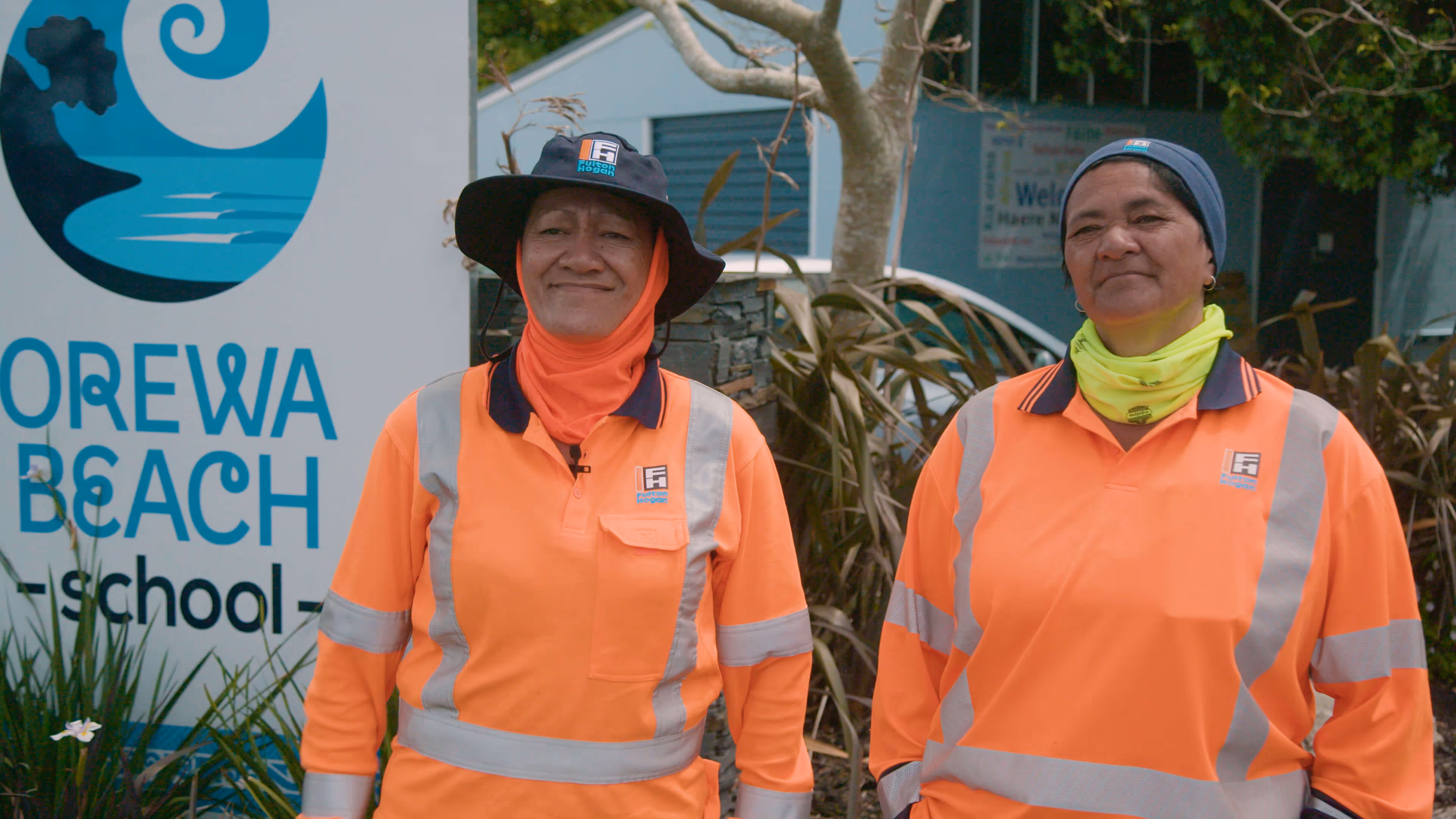 Shirlz and Tania, on site working for Fulton Hogan and with their community. and loading food into the pataka boxes