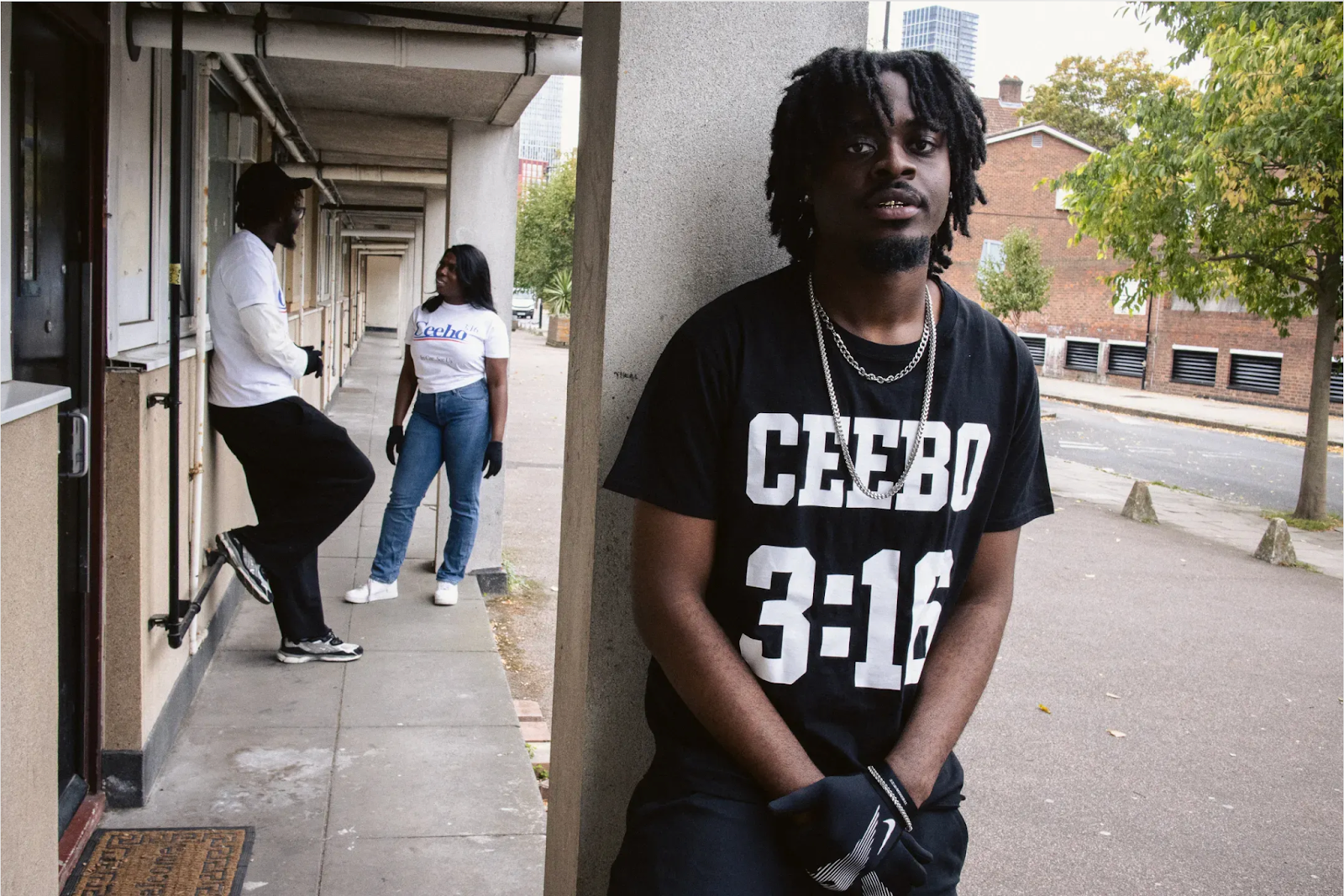 A person leaning against a pillarAI-generated content may be incorrect.