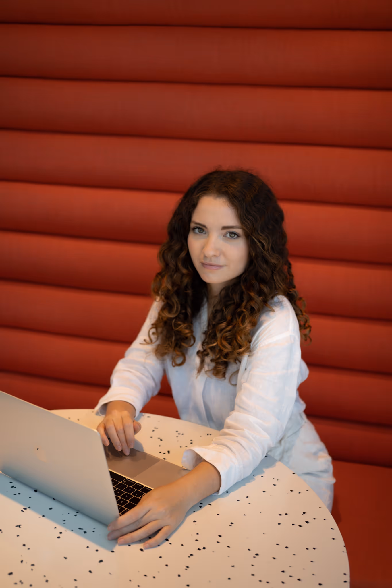 Image of me with a laptop looking at the camera.