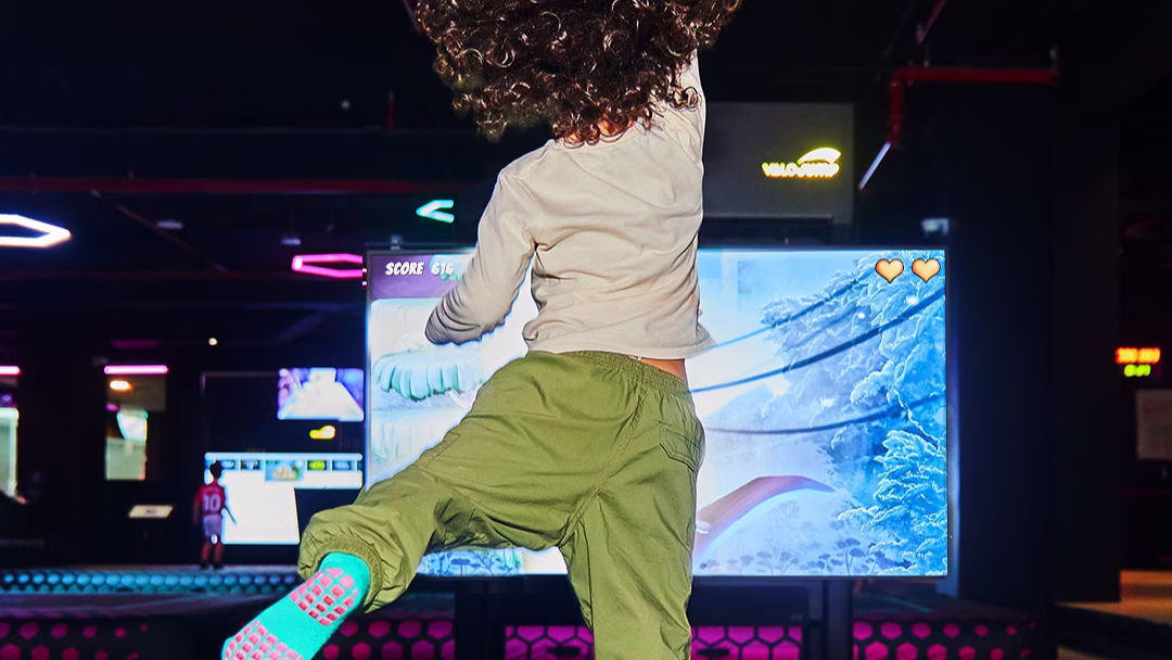 Child having fun playing Skytails on ValoJump air