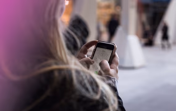 Women look at map to find fertility clinic