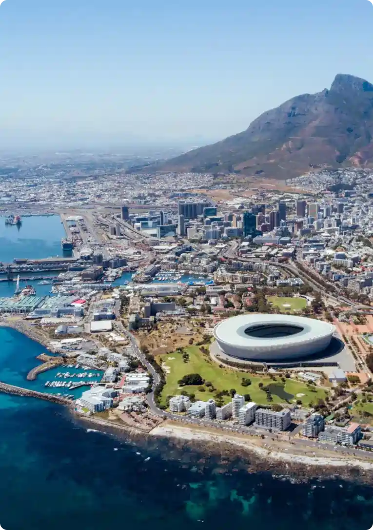 Cape Town aerial cityscape and Table Mountain representing Airbnb management company in South Africa.