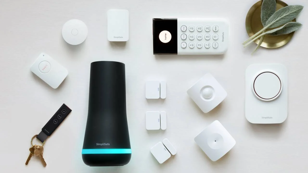 an image of Simplisafe home security system components laid out on the table