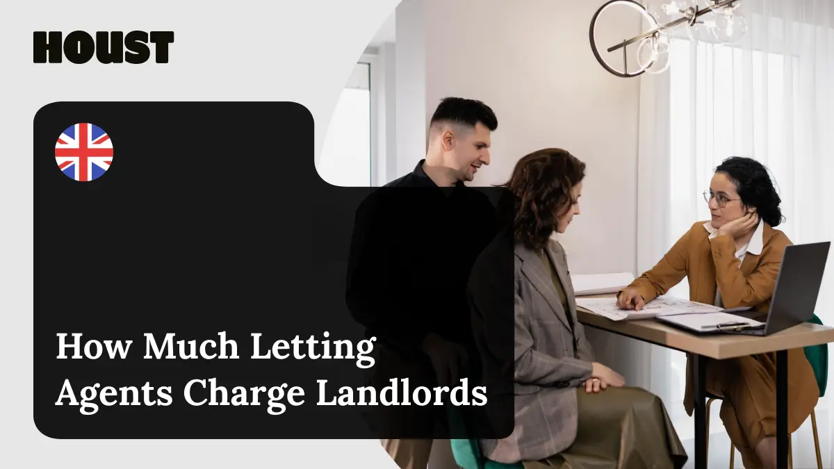 Letting agent going through property plans and paperwork with two clients at a desk with a laptop