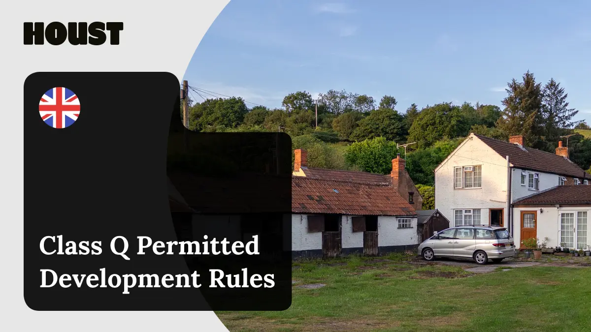 Whitewashed farm outbuildings with red tiled roofs next to a farmhouse in the English countryside