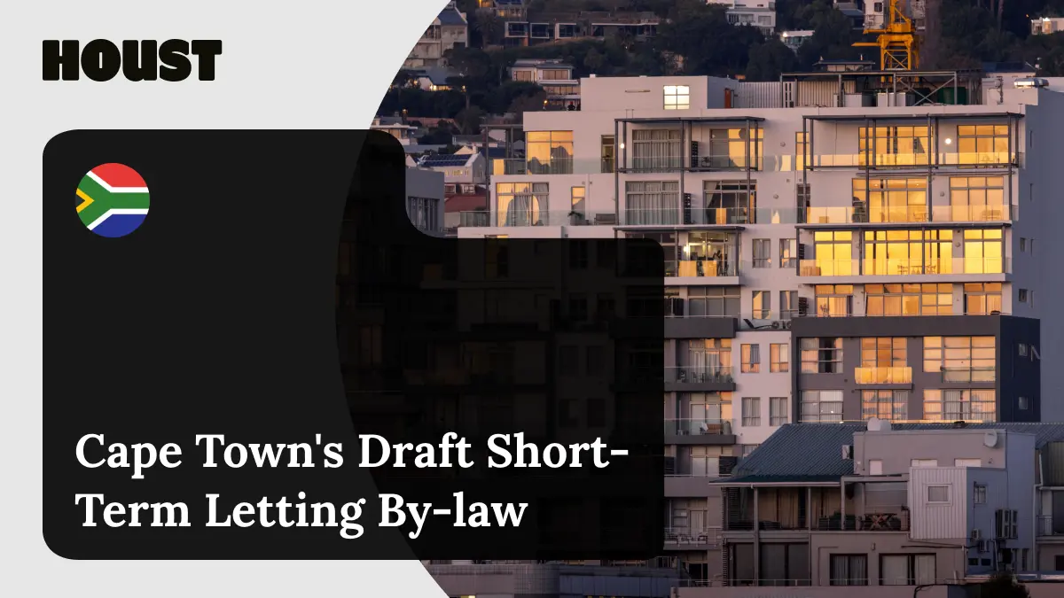 Apartment buildings with lit windows on a Cape Town hillside at dusk, featured image for Houst's guide to the City's draft short-term letting by-law