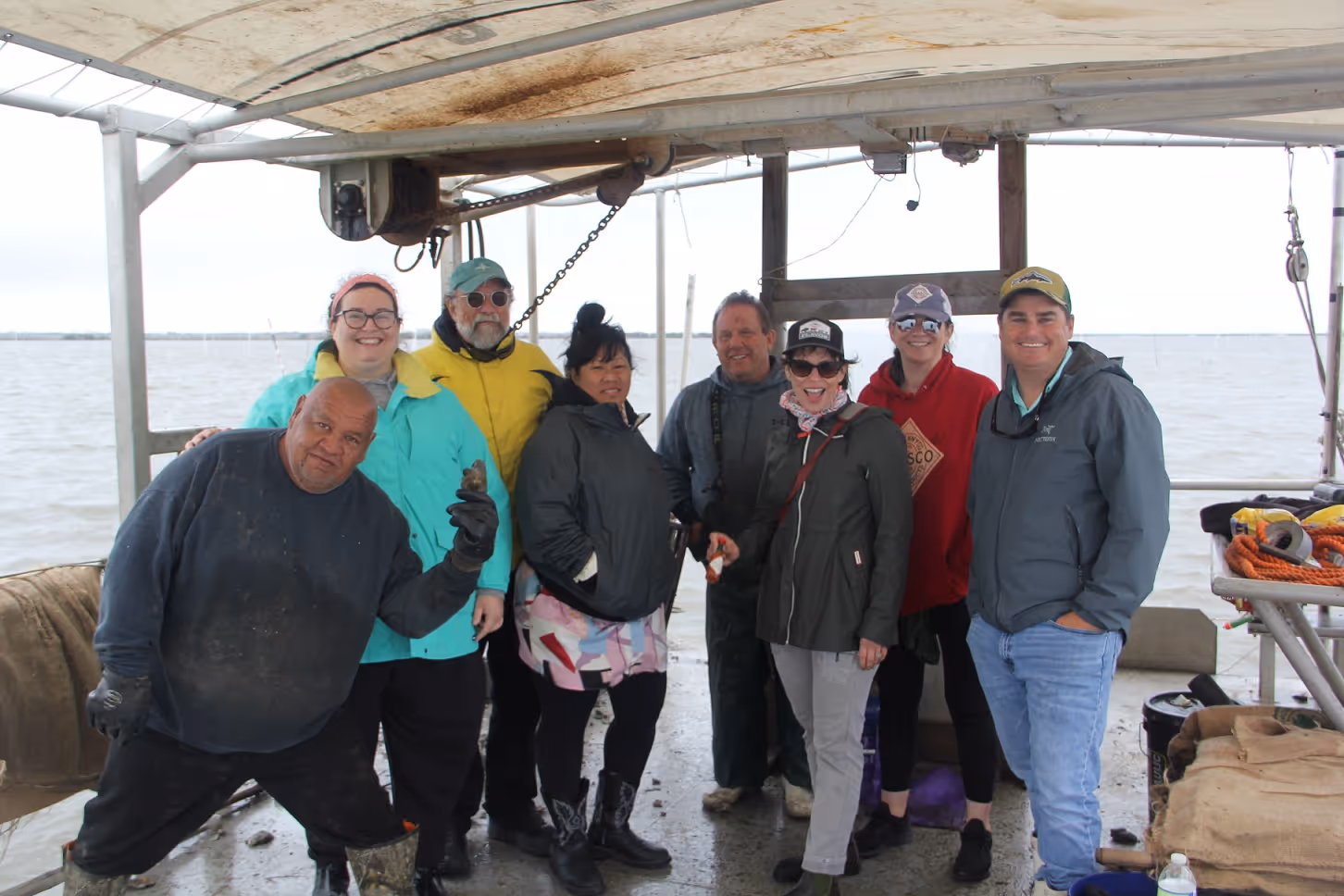 group of people on the water in a boat