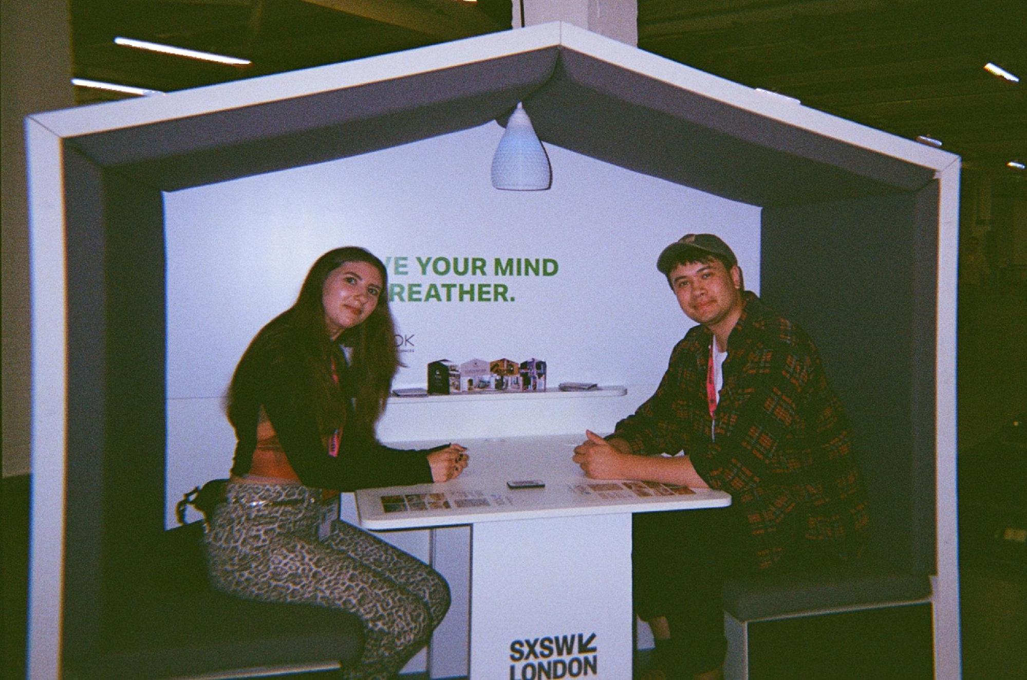 Alumni Felicity and Soren pictured in a booth as another inspiring day at SXSW London draws to a close