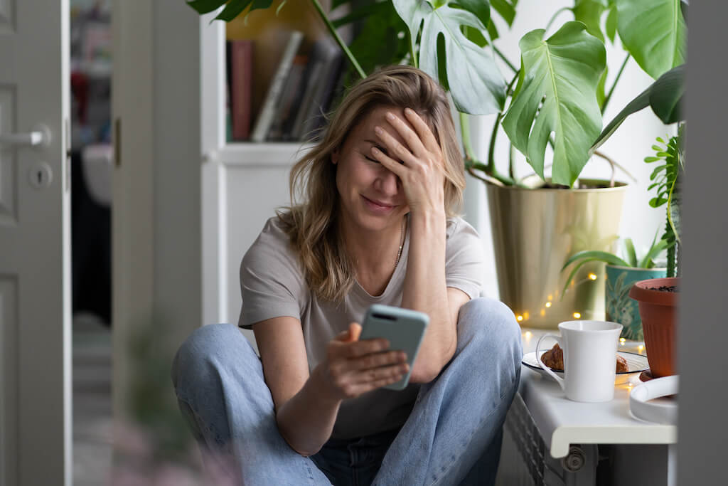 A women frustrated at her phone