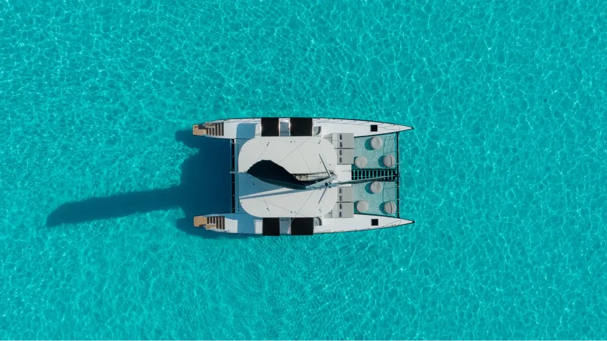 Aerial view of a luxury catamaran off Cancún