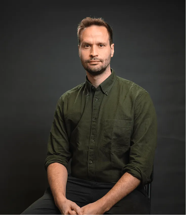 Paul Mayer lächelt