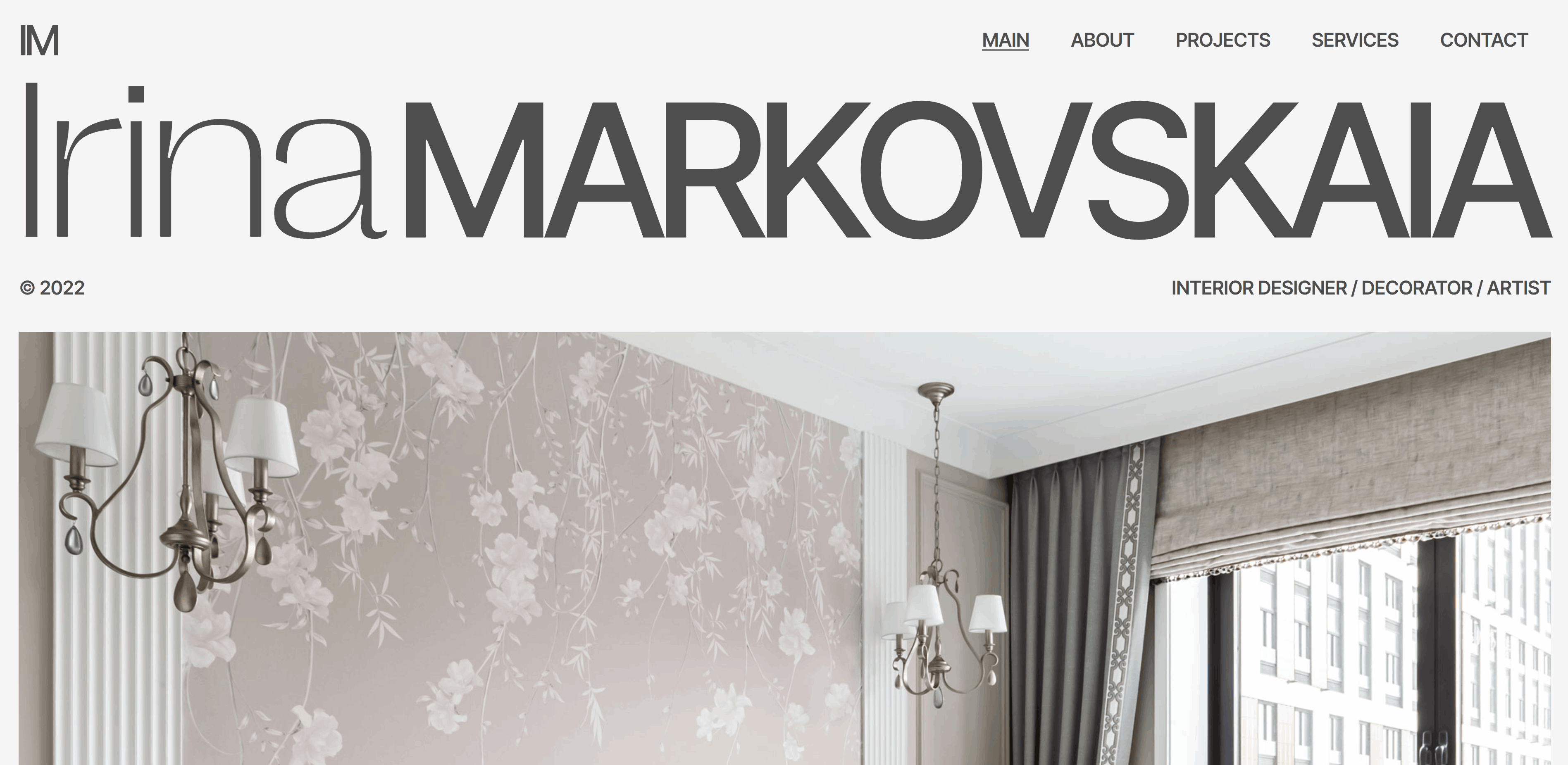 An image of Irina Markovskaia’s website with an off-white background, dark grey text, and an image of a bedroom.