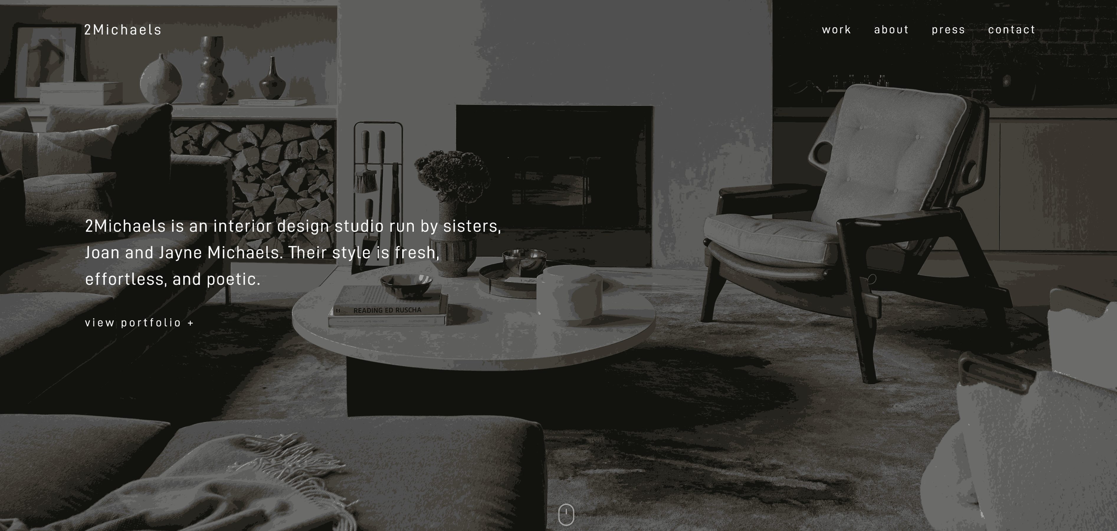 A screenshot of 2Michaels’ home page, featuring white text in the left center, top-left, and top-right of the screen. The background is an image of a client’s home interior.