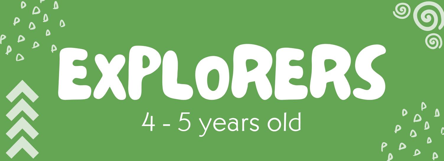 A woman helping 2 girls with their arts and crafts at a table.