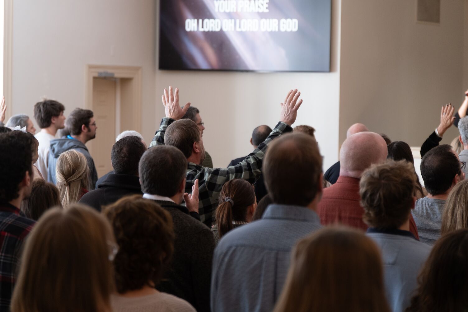 People worshipping at church