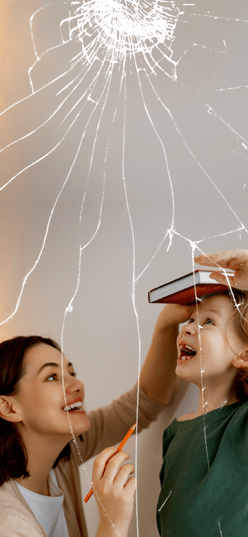girls laughing with cracked screen