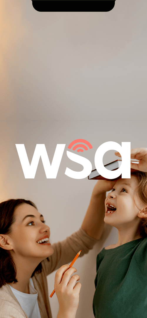 girls laughing with wsa logo in front