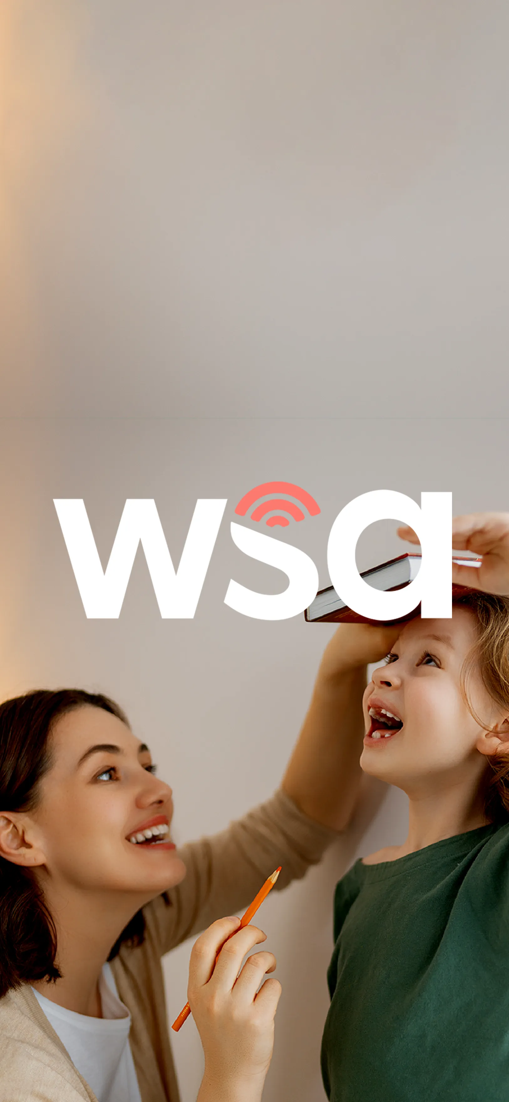 girls laughing with wsa logo in front