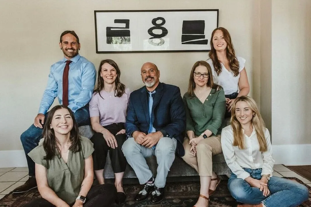 Austin therapist team sitting on a couch