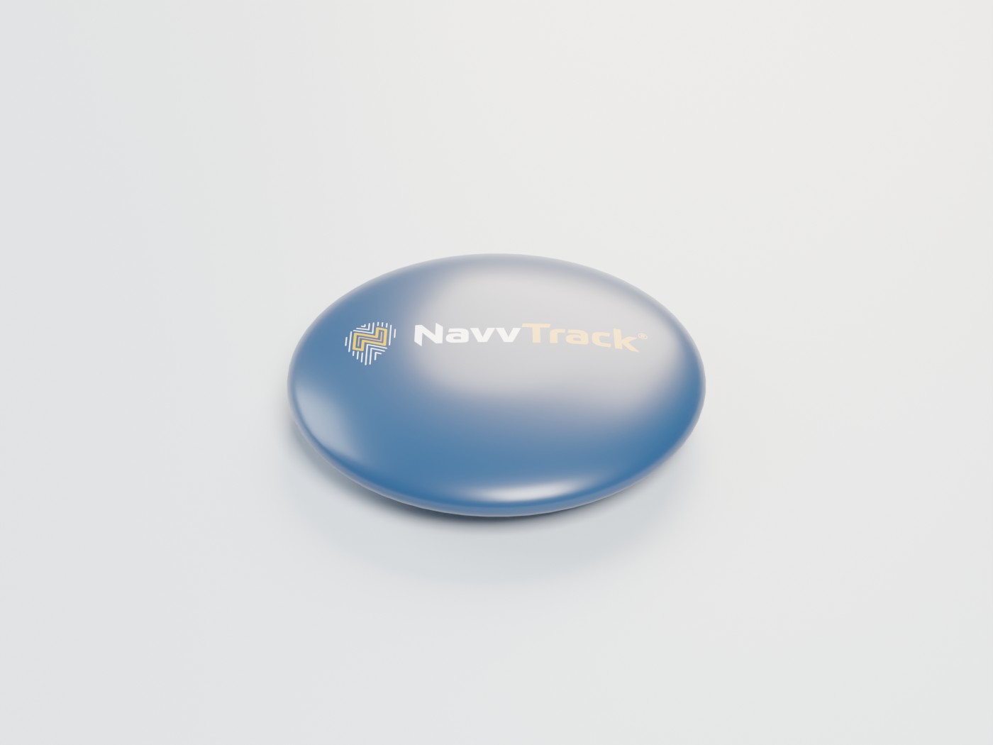 NavvTrack asset tag &mdash; a coin-sized Bluetooth tag with a navy branded face and polished steel back