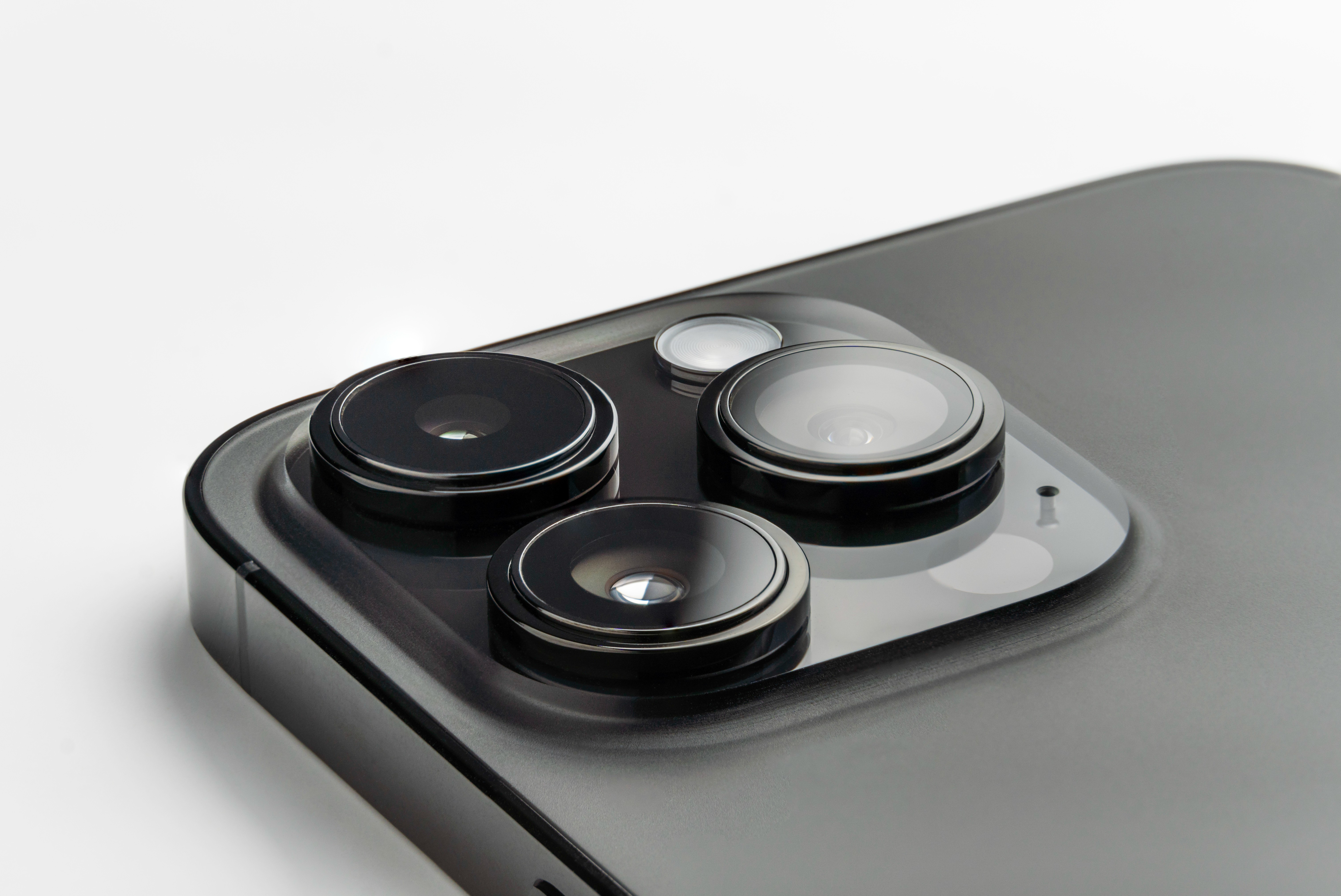 Close-up of the rear camera lenses on an iPhone