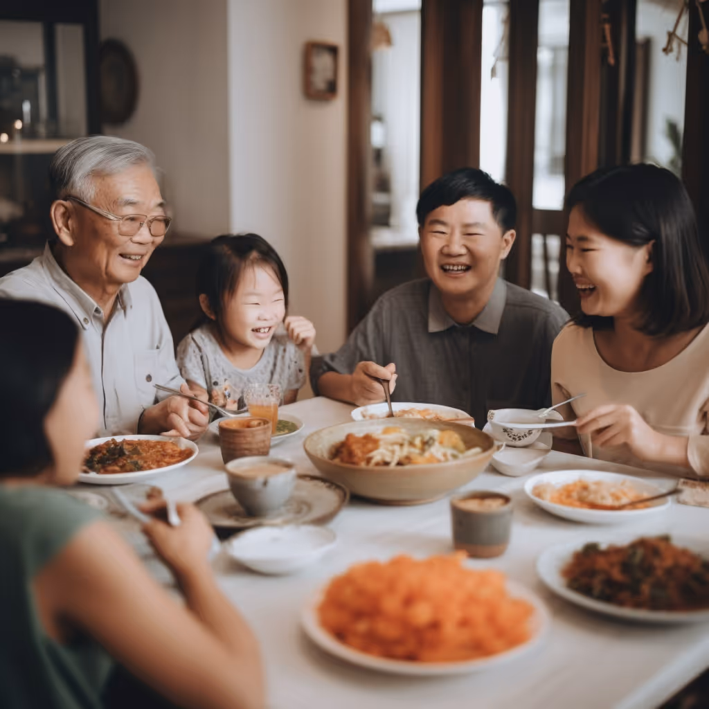 family smiling around dinner table in harmony