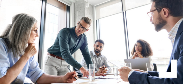 people around a desk