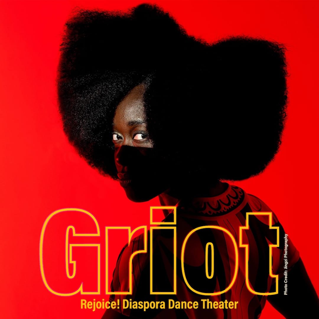 A near silhouette profile photo of Oluyinka, wearing a giant afro, looking over her shoulder at the camera in front of a red background.