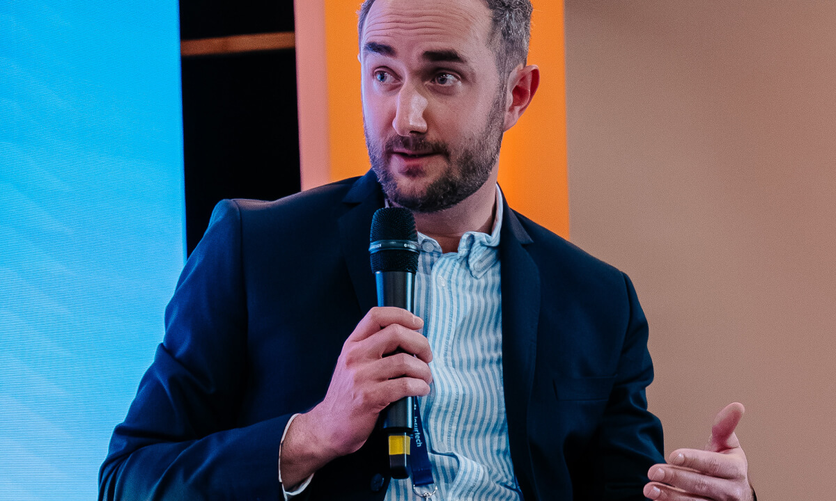 Guillaume Roux, Head of Business Development at Qover, moderating a panel on autonomous vehicle insurance at Insurtech Insights 2026.