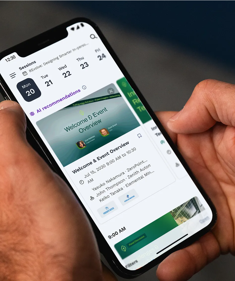 Attendee checking agenda on mobile app at event with ai suggested sessions.
