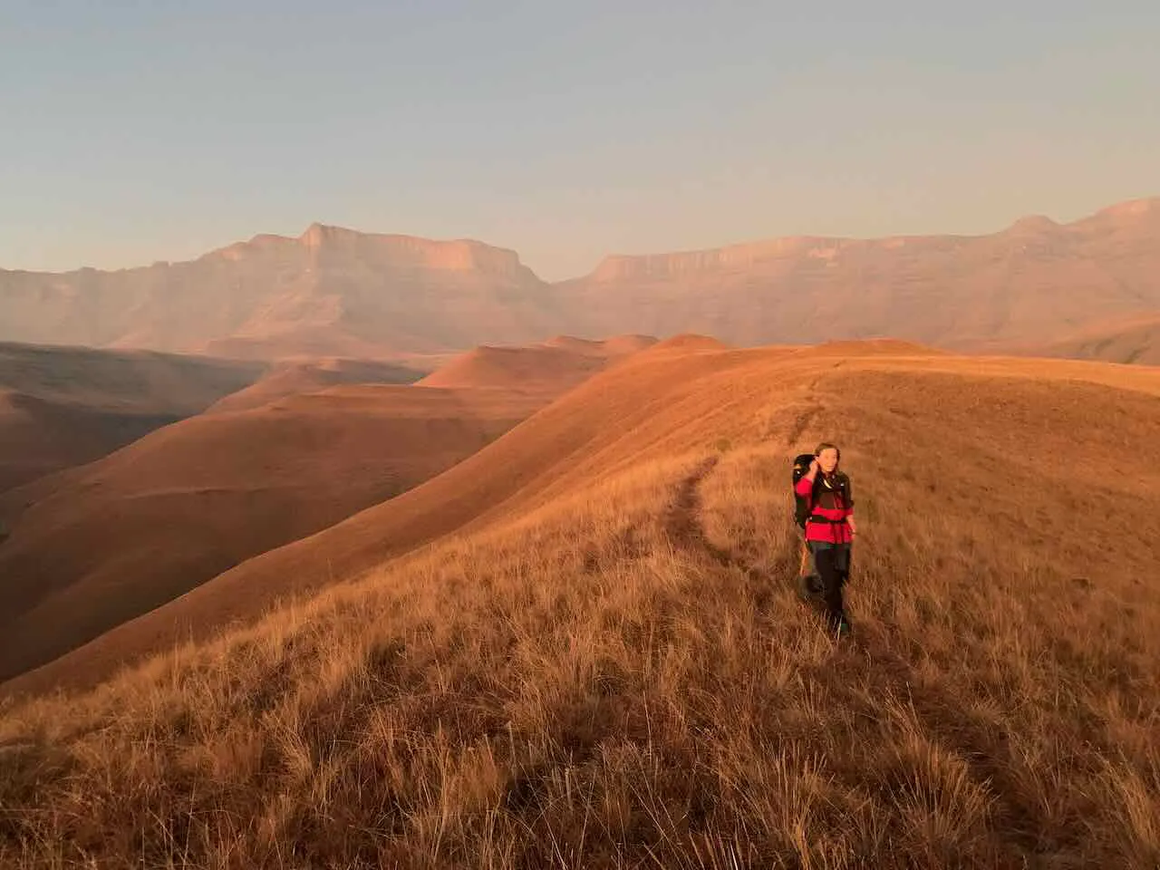 Sunrise on Giants Ridge en route to the Ice Climbing. Giants Castle, Drakensberg