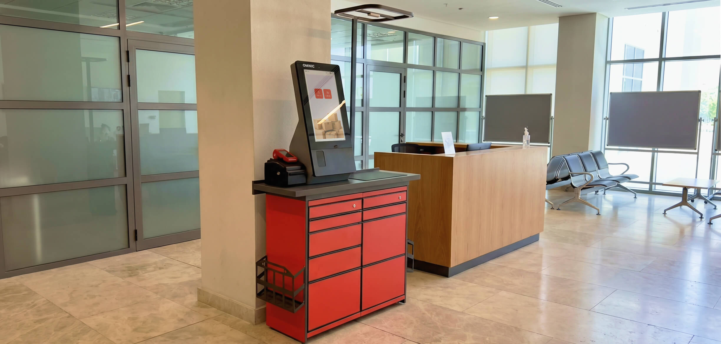 Self-service parcel drop-off kiosk installed in an airport post office