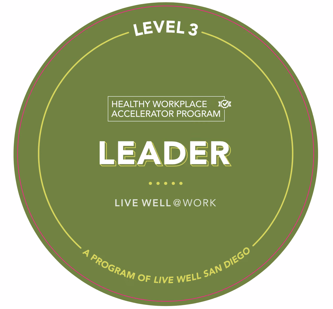 Green circular badge with text indicating Level 3 Leader in the Healthy Workplace Accelerator Program by Live Well San Diego.