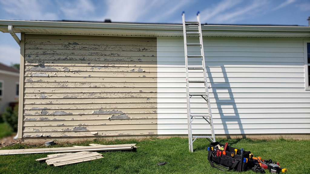 Partial siding repair on residential home exterior