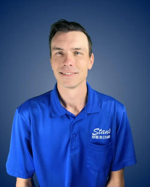 Price Taggart in blue "Stan's" HVAC uniform.